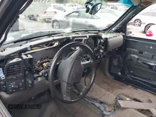 ✅ 2005 Chevrolet Suburban Z71 • VIN: 3GNFK16Z75G270885 • Лот: 41916525. Опубликован ранее на IAAI с пробегом Не указан. Бесплатный доступ к архиву аукционных продаж из США и подробный отчёт об истории автомобиля на DreamBid. Изображение 6.