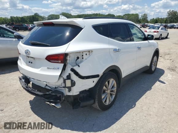 ✅ 2017 Hyundai Santa Fe 2.0T • VIN: 5XYZU3LA7HG390540 • Лот: 63862624. Опубликован ранее на Copart с пробегом 91 602 миль. Бесплатный доступ к архиву аукционных продаж из США и подробный отчёт об истории автомобиля на DreamBid. Изображение 3.