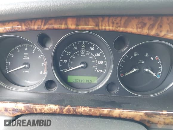 ✅ 2005 Jaguar XJ 8 LWB • VIN: SAJWA79C55SG41528 • Lot: 43405819. Wystawiony na IAAI z przebiegiem 157 149 mil. Bezpłatny archiwum sprzedaży aukcyjnych z USA i szczegółowy raport historii pojazdu na DreamBid. Zdjęcie 7.