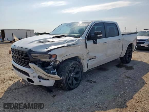 2021 Ram 1500 Limited with VIN 1C6SRFHT0MN640354, listed as a Copart auction lot 69665575 with 96,541 mi miles and Salvage title. Bid and sale history available at DreamBid. Image 1.
