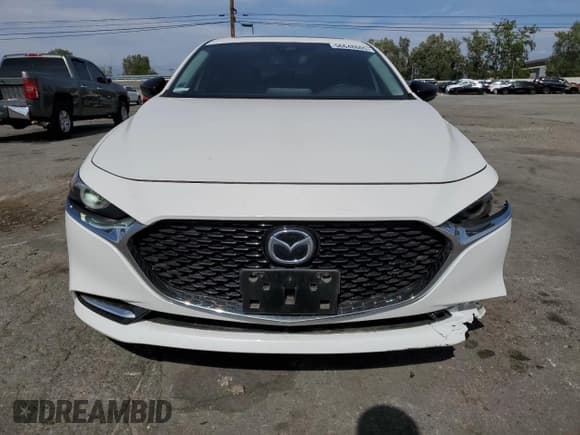 ✅ 2022 Mazda 3 2.5 Turbo • VIN: 3MZBPBAY9NM302022 • Lot: 56648605. Listed on Copart with 51,785 mi. Free auction sales archive from the USA and detailed vehicle history report at DreamBid. Image 5.
