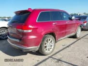 ✅ 2015 Jeep Grand Cherokee Summit • VIN: 1C4RJEJG9FC100568 • Lot: 42512705. Listed on IAAI with 128,413 mi. Free auction sales archive from the USA and detailed vehicle history report at DreamBid. Image 4.