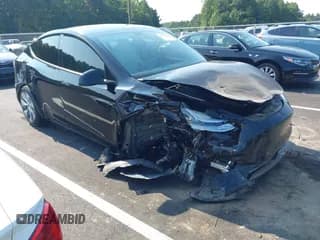 ✅ 2020 Tesla Model Y Long Range • VIN: 5YJYGDEE5LF037285 • Lot: 43001650. Listed on IAAI with 129,969 mi. Free auction sales archive from the USA and detailed vehicle history report at DreamBid. Image 1.