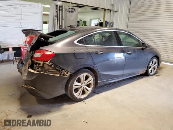 ✅ 2017 Chevrolet Cruze Premier • VIN: 1G1BF5SM9H7118449 • Lot: 68184502. Listed on Copart with 96,367 mi. Free auction sales archive from the USA and detailed vehicle history report at DreamBid. Image 3.