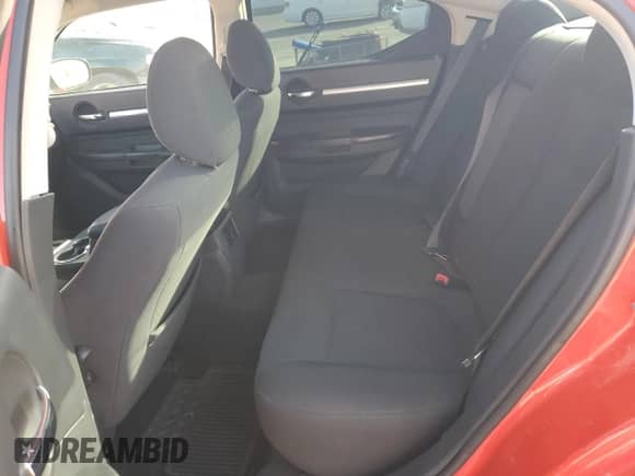 2010 Dodge Charger SXT with VIN 2B3CA3CV8AH118153, listed as a Copart auction lot 79950384 with 119,953 mi miles and Salvage title. Bid and sale history available at DreamBid. Image 10.