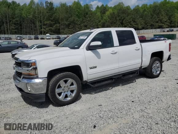 2018 Chevrolet Silverado 1500 LT с VIN 3GCUKREC7JG489299, выставлен на аукционе Copart как лот 53777255 с пробегом 50 384 миль миль и Списание • Salvage title. История ставок и продаж доступна на DreamBid. Изображение 1.