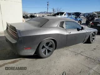 ✅ 2013 Dodge Challenger SXT • VIN: 2C3CDYAG2DH610743 • Lot: 86711964. Wystawiony na Copart z przebiegiem 186 578 mil. Bezpłatny archiwum sprzedaży aukcyjnych z USA i szczegółowy raport historii pojazdu na DreamBid. Zdjęcie 3.