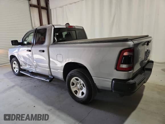 2023 Ram 1500 Tradesman z VIN 1C6RRFCG4PN615468, wystawiony jako Copart lot #89879455 z przebiegiem 12 054 mil mil oraz Czysty tytuł • Clean title. Historia ofert i sprzedaży dostępna na DreamBid. Obrazek 2.