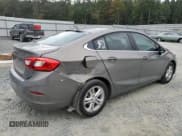 ✅ 2018 Chevrolet Cruze LT • VIN: 1G1BE5SMXJ7246580 • Lot: 81863505. Listed on Copart with 93,506 mi. Free auction sales archive from the USA and detailed vehicle history report at DreamBid. Image 3.