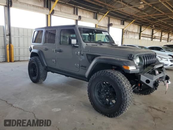 ✅ 2022 Jeep Wrangler Unlimited High Tide • VIN: 1C4HJXDG2NW221829 • Lot: 64836074. Listed on Copart with 3,394 mi. Free auction sales archive from the USA and detailed vehicle history report at DreamBid. Image 4.