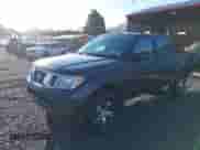 2012 Nissan Frontier SL with VIN 1N6AD0EV4CC430241, listed as a IAAI auction lot 43408515 with 148,428 mi miles and . Bid and sale history available at DreamBid. Image 2.