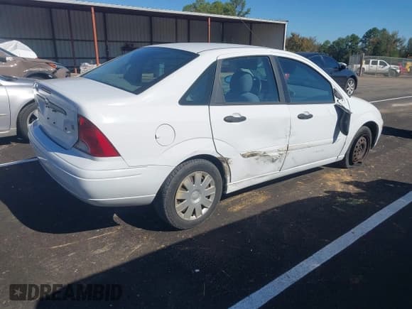✅ 2004 Ford Focus SE • VIN: 1FAFP34314W142443 • Лот: 43601717. Опубликован ранее на IAAI с пробегом 17 015 миль. Бесплатный доступ к архиву аукционных продаж из США и подробный отчёт об истории автомобиля на DreamBid. Изображение 4.