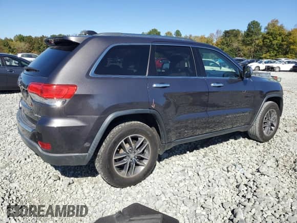 2017 Jeep Grand Cherokee Limited with VIN 1C4RJEBG0HC944015, listed as a Copart auction lot 82507335 with 141,846 mi miles and Salvage title. Bid and sale history available at DreamBid. Image 3.