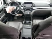 ✅ 2018 Honda Odyssey Elite • VIN: 5FNRL6H92JB028423 • Лот: 54118045. Опубликован ранее на Copart с пробегом 70 026 миль. Бесплатный доступ к архиву аукционных продаж из США и подробный отчёт об истории автомобиля на DreamBid. Изображение 8.