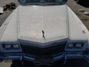 ✅ 1976 Cadillac Eldorado • VIN: 6L67S4Q405945 • Lot: 73257834. Wystawiony na Copart z przebiegiem 98 761 mil. Bezpłatny archiwum sprzedaży aukcyjnych z USA i szczegółowy raport historii pojazdu na DreamBid. Zdjęcie 11.