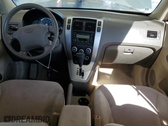 ✅ 2006 Hyundai Tucson GLS • VIN: KM8JN12D36U346052 • Lot: 92340375. Listed on Copart with 119,665 mi. Free auction sales archive from the USA and detailed vehicle history report at DreamBid. Image 8.