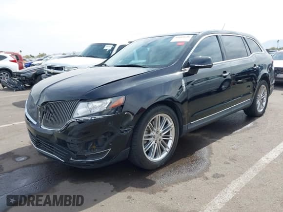 ✅ 2016 Lincoln MKT EcoBoost • VIN: 2LMHJ5AT5GBL01345 • Lot: 41604646. Listed on IAAI with 41,282 mi. Free auction sales archive from the USA and detailed vehicle history report at DreamBid. Image 2.