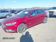 ✅ 2018 Ford Fusion Titanium • VIN: 3FA6P0SU3JR106441 • Lot: 41699936. Listed on IAAI with 146,330 mi. Free auction sales archive from the USA and detailed vehicle history report at DreamBid. Image 2.