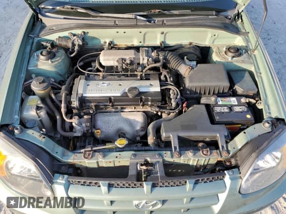 2005 Hyundai Accent GLS z VIN KMHCG45C35U595666, wystawiony jako Copart lot #88294365 z przebiegiem 70 497 mil mil oraz Szkoda całkowita • Salvage title. Historia ofert i sprzedaży dostępna na DreamBid. Obrazek 11.