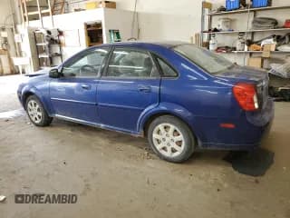 ✅ 2005 Suzuki Forenza S • VIN: KL5JD56Z85K231581 • Lot: 78122504. Listed on Copart with 138,746 mi. Free auction sales archive from the USA and detailed vehicle history report at DreamBid. Image 2.