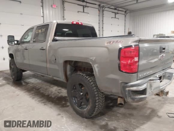 ✅ 2017 Chevrolet Silverado 2500HD Work Truck • VIN: 1GC1KUEG0HF128856 • Lot: 42046701. Listed on IAAI with 200,705 mi. Free auction sales archive from the USA and detailed vehicle history report at DreamBid. Image 3.