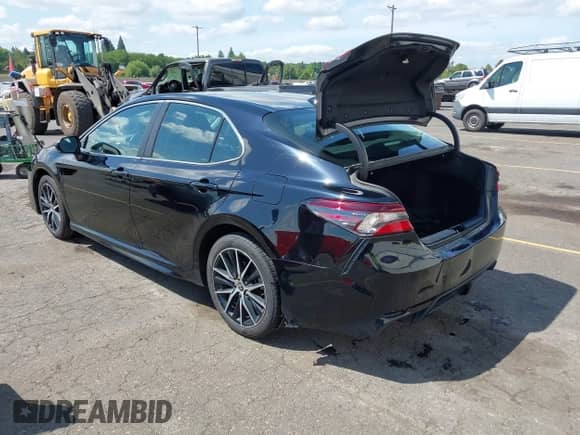 2022 Toyota Camry SE with VIN 4T1G11BK1NU050000, listed as a IAAI auction lot 42348766 with 57,429 mi miles and . Bid and sale history available at DreamBid. Image 3.