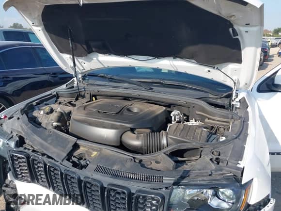 2022 Jeep Grand Cherokee Laredo E with VIN 1C4RJEAGXNC127857, listed as a IAAI auction lot 43202403 with 66,201 mi miles and . Bid and sale history available at DreamBid. Image 10.