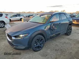 ✅ 2023 Mazda CX-30 S Carbon Edition • VIN: 3MVDMBCM3PM578809 • Lot: 95760875. Listed on Copart with 28,054 mi. Free auction sales archive from the USA and detailed vehicle history report at DreamBid. Image 1.