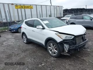 ✅ 2013 Hyundai Santa Fe Sport • VIN: 5XYZW3LA0DG019935 • Lot: 42524581. Listed on IAAI with 105,263 mi. Free auction sales archive from the USA and detailed vehicle history report at DreamBid. Image 1.
