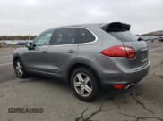 ✅ 2014 Porsche Cayenne • VIN: WP1AA2A22ELA95985 • Лот: 90595065. Опубликован ранее на Copart с пробегом 66 800 миль. Бесплатный доступ к архиву аукционных продаж из США и подробный отчёт об истории автомобиля на DreamBid. Изображение 2.