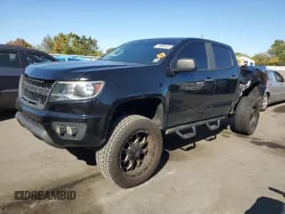 ✅ 2019 Chevrolet Colorado 4WD Work Truck • VIN: 1GCGTBENXK1220457 • Лот: 75680424. Опубликован ранее на Copart с пробегом 105 722 миль. Бесплатный доступ к архиву аукционных продаж из США и подробный отчёт об истории автомобиля на DreamBid. Изображение 1.