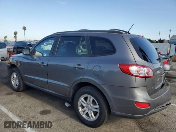 2010 Hyundai Santa Fe GLS with VIN 5NMSG3AB6AH379299, listed as a Copart auction lot 65987014 with 134,917 mi miles and Salvage title. Bid and sale history available at DreamBid. Image 2.