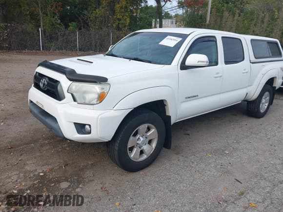 ✅ 2013 Toyota Tacoma • VIN: 3TMMU4FNXDM060144 • Lot: 43382954. Listed on IAAI with 138,717 mi. Free auction sales archive from the USA and detailed vehicle history report at DreamBid. Image 17.