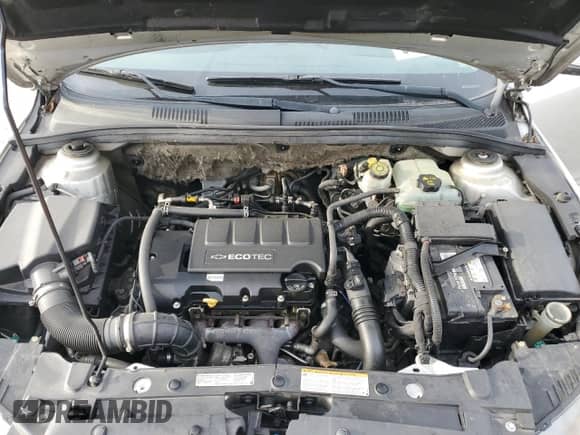 2012 Chevrolet Cruze 1FL z VIN 1G1PE5SC4C7358761, wystawiony jako Copart lot #67396415 z przebiegiem 218 890 mil mil oraz Szkoda całkowita • Salvage title. Historia ofert i sprzedaży dostępna na DreamBid. Obrazek 11.