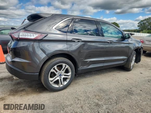 ✅ 2015 Ford Edge Titanium • VIN: 2FMTK4K90FBB13511 • Lot: 71624465. Listed on Copart with 168,052 mi. Free auction sales archive from the USA and detailed vehicle history report at DreamBid. Image 3.