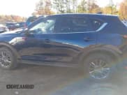 ✅ 2021 Mazda CX-5 Touring • VIN: JM3KFBCM2M0446455 • Lot: 43464164. Wystawiony na IAAI z przebiegiem 161 106 mil. Bezpłatny archiwum sprzedaży aukcyjnych z USA i szczegółowy raport historii pojazdu na DreamBid. Zdjęcie 14.