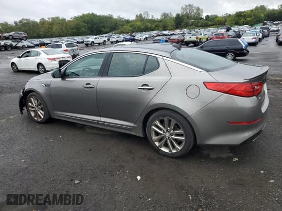 ✅ 2015 Kia Optima SX Turbo • VIN: 5XXGR4A69FG400550 • Lot: 83816245. Listed on Copart with 142,907 mi. Free auction sales archive from the USA and detailed vehicle history report at DreamBid. Image 2.