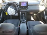 ✅ 2023 Toyota Corolla Cross XLE • VIN: 7MUEAABG3PV066915 • Лот: 86059245. Опубликован ранее на Copart с пробегом 62 017 миль. Бесплатный доступ к архиву аукционных продаж из США и подробный отчёт об истории автомобиля на DreamBid. Изображение 8.