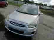 2012 Hyundai Accent GLS z VIN KMHCT4AE8CU089167, wystawiony jako Copart lot #90483405 z przebiegiem 138 860 mil mil oraz Szkoda całkowita • Salvage title. Historia ofert i sprzedaży dostępna na DreamBid. Obrazek 13.