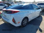 ✅ 2021 Toyota Prius XLE • VIN: JTDKAMFP5M3165273 • Lot: 43822615. Listed on IAAI with 70,012 mi. Free auction sales archive from the USA and detailed vehicle history report at DreamBid. Image 4.