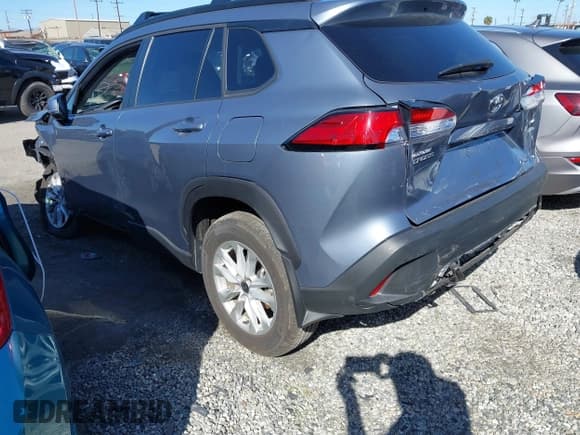 ✅ 2023 Toyota Corolla Cross LE • VIN: 7MUBAABG8PV045934 • Lot: 41593101. Listed on IAAI with 11,378 mi. Free auction sales archive from the USA and detailed vehicle history report at DreamBid. Image 3.