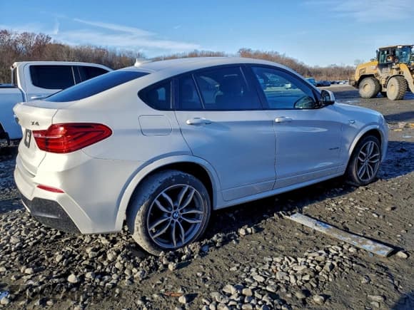 ✅ 2015 BMW X4 xDrive28i • VIN: 5UXXW3C52F0M87926 • Lot: 94218295. Listed on Copart with 94,567 mi. Free auction sales archive from the USA and detailed vehicle history report at DreamBid. Image 3.
