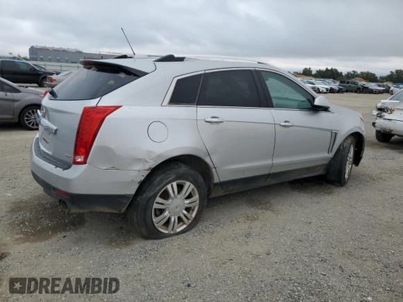 ✅ 2015 Cadillac SRX Luxury Collection • VIN: 3GYFNEE35FS618132 • Lot: 84650355. Wystawiony na Copart z przebiegiem Nie podano. Bezpłatny archiwum sprzedaży aukcyjnych z USA i szczegółowy raport historii pojazdu na DreamBid. Zdjęcie 3.
