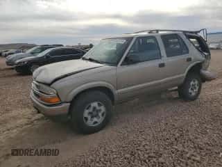 2003 Chevrolet Blazer LS z VIN 1GNDT13X73K112544, wystawiony jako Copart lot #83819714 z przebiegiem 96 738 mil mil oraz Szkoda całkowita • Salvage title. Historia ofert i sprzedaży dostępna na DreamBid. Obrazek 1.