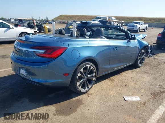 ✅ 2016 Buick Cascada Premium • VIN: W04WT3N52GG037019 • Lot: 42181815. Listed on IAAI with 62,258 mi. Free auction sales archive from the USA and detailed vehicle history report at DreamBid. Image 4.