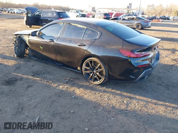 ✅ 2024 BMW 8 Series M850i • VIN: WBAGV8C00RCN95483 • Lot: 41294811. Listed on IAAI with Not provided. Free auction sales archive from the USA and detailed vehicle history report at DreamBid. Image 3.