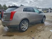 ✅ 2012 Cadillac SRX Performance Collection • VIN: 3GYFNBE37CS532590 • Lot: 94237585. Listed on Copart with 166,412 mi. Free auction sales archive from the USA and detailed vehicle history report at DreamBid. Image 3.