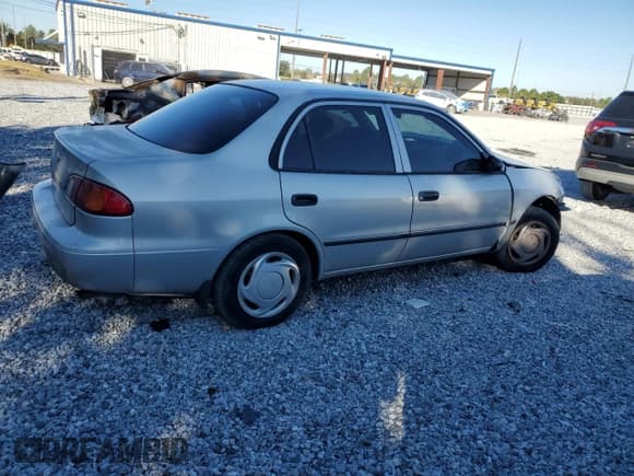 ✅ 2000 Toyota Corolla CE • VIN: 1NXBR12E2YZ392203 • Лот: 90441485. Опубликован ранее на Copart с пробегом Не указан. Бесплатный доступ к архиву аукционных продаж из США и подробный отчёт об истории автомобиля на DreamBid. Изображение 3.