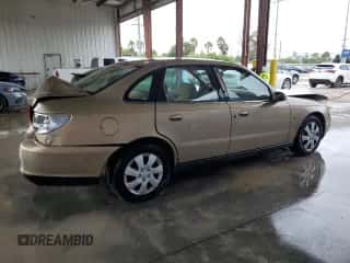 2001 Saturn LS z VIN 1G8JU52F71Y556133, wystawiony jako Copart lot #74704314 z przebiegiem 199 915 mil mil oraz Szkoda całkowita • Salvage title. Historia ofert i sprzedaży dostępna na DreamBid. Obrazek 3.