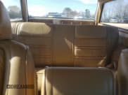 ✅ 1988 Jeep Grand Wagoneer • VIN: 1JCNJ15U9JT105185 • Lot: 89126005. Wystawiony na Copart z przebiegiem 116 630 mil. Bezpłatny archiwum sprzedaży aukcyjnych z USA i szczegółowy raport historii pojazdu na DreamBid. Zdjęcie 10.